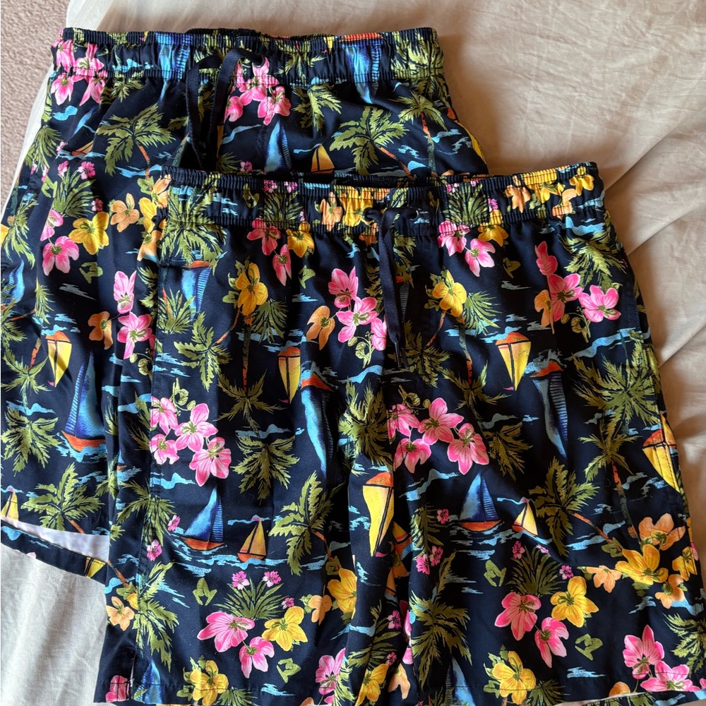 Old Navy 2-pack Floral Swim Shorts with Yellow and Pink Accents. Never worn.